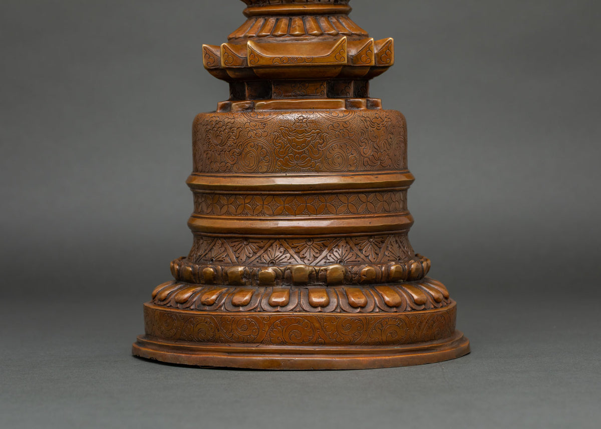 Kadampa Stupa featuring carved lotus pedestal and auspicious Buddhist symbols
