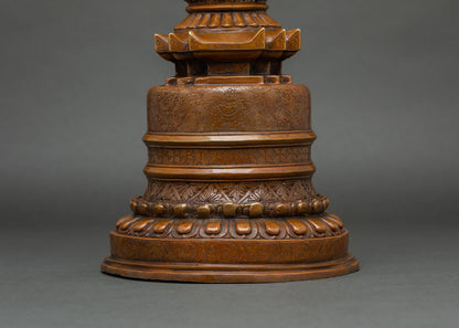 Kadampa Stupa featuring carved lotus pedestal and auspicious Buddhist symbols