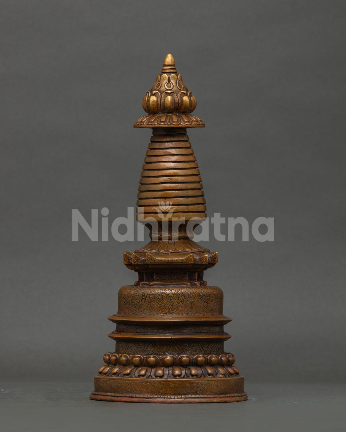 Kadampa Stupa handcrafted from copper by Newari artists from Patan Nepal.