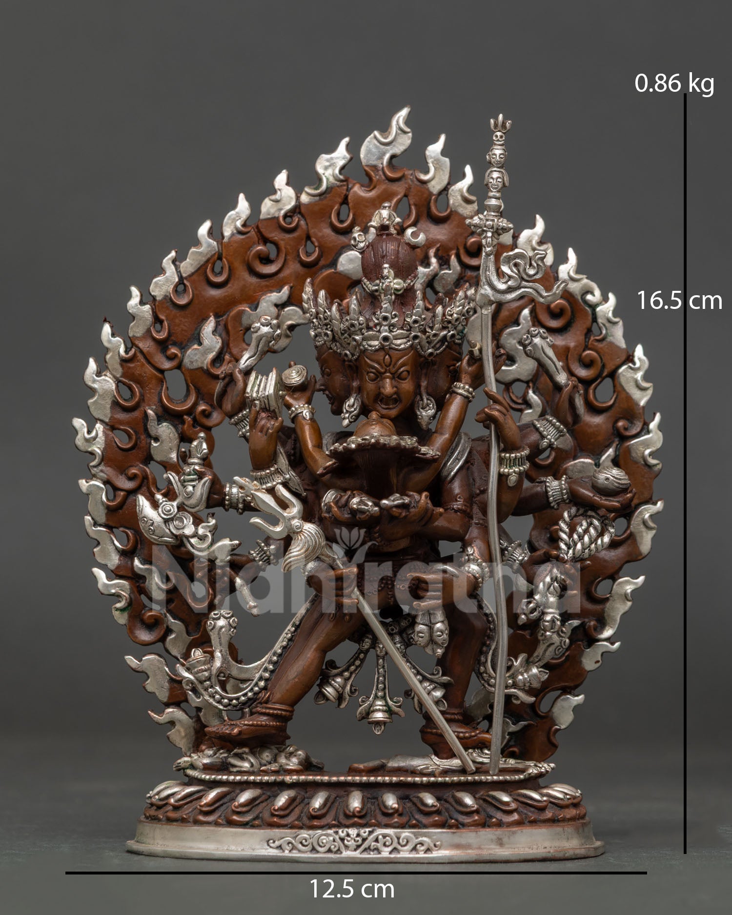 Kalachakra statue from Nepal with four faces and twenty-four arms.