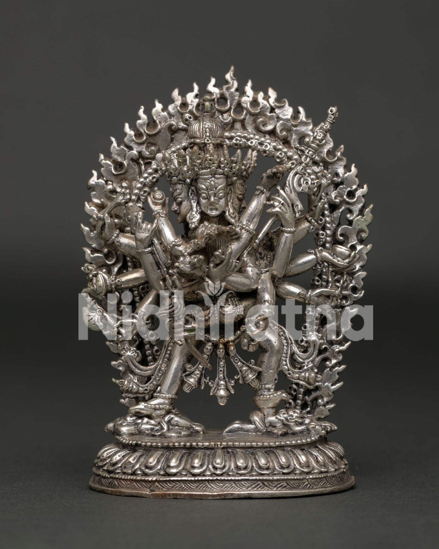 Kalachakra statue handcrafted by Newari artist in Patan Nepal with silver plated copper finish.