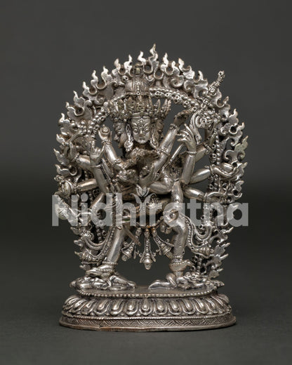Kalachakra statue handcrafted by Newari artist in Patan Nepal with silver plated copper finish.