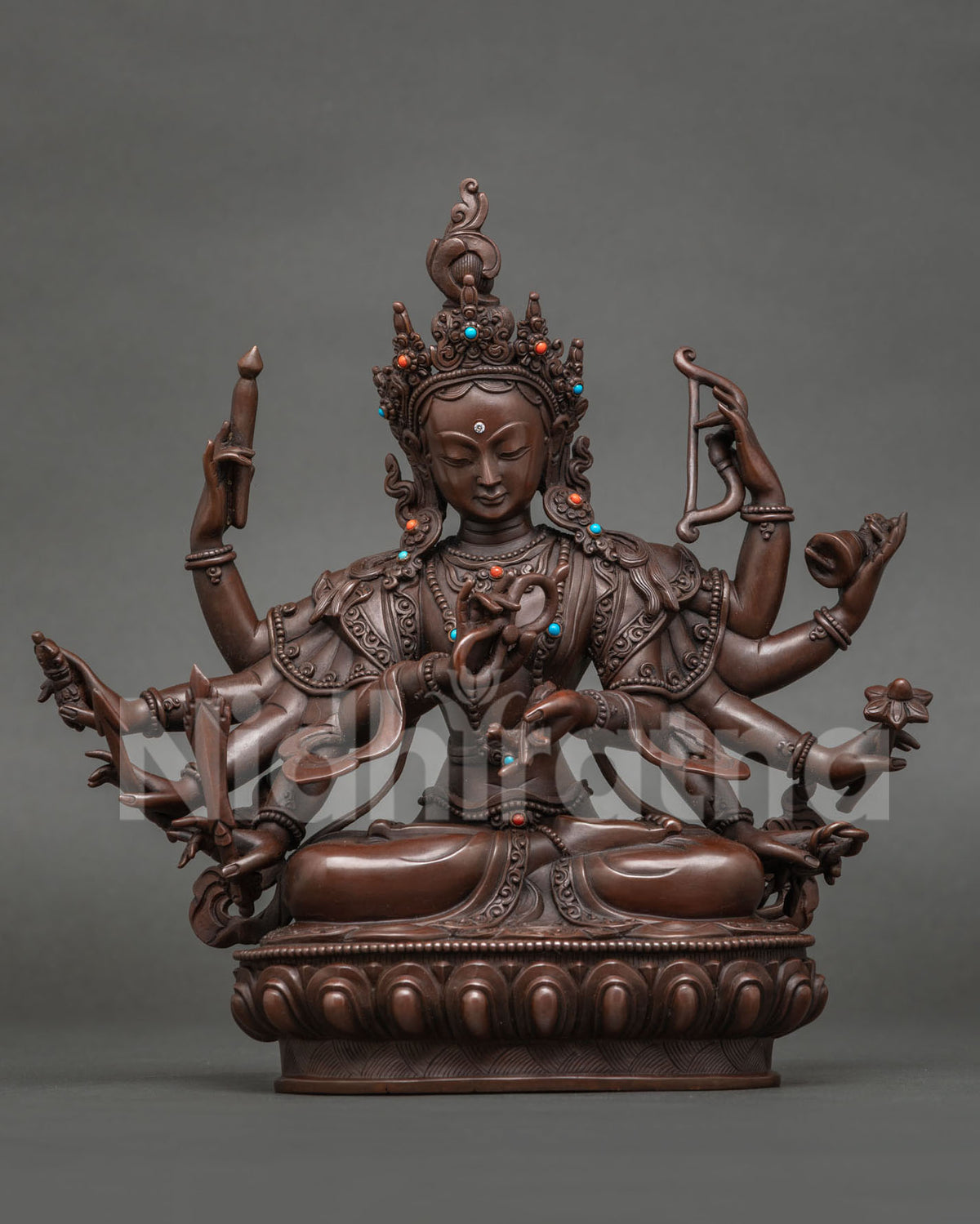 Kanakavarni Tara statue, many-armed Tara of prosperity and longevity, oxidized copper