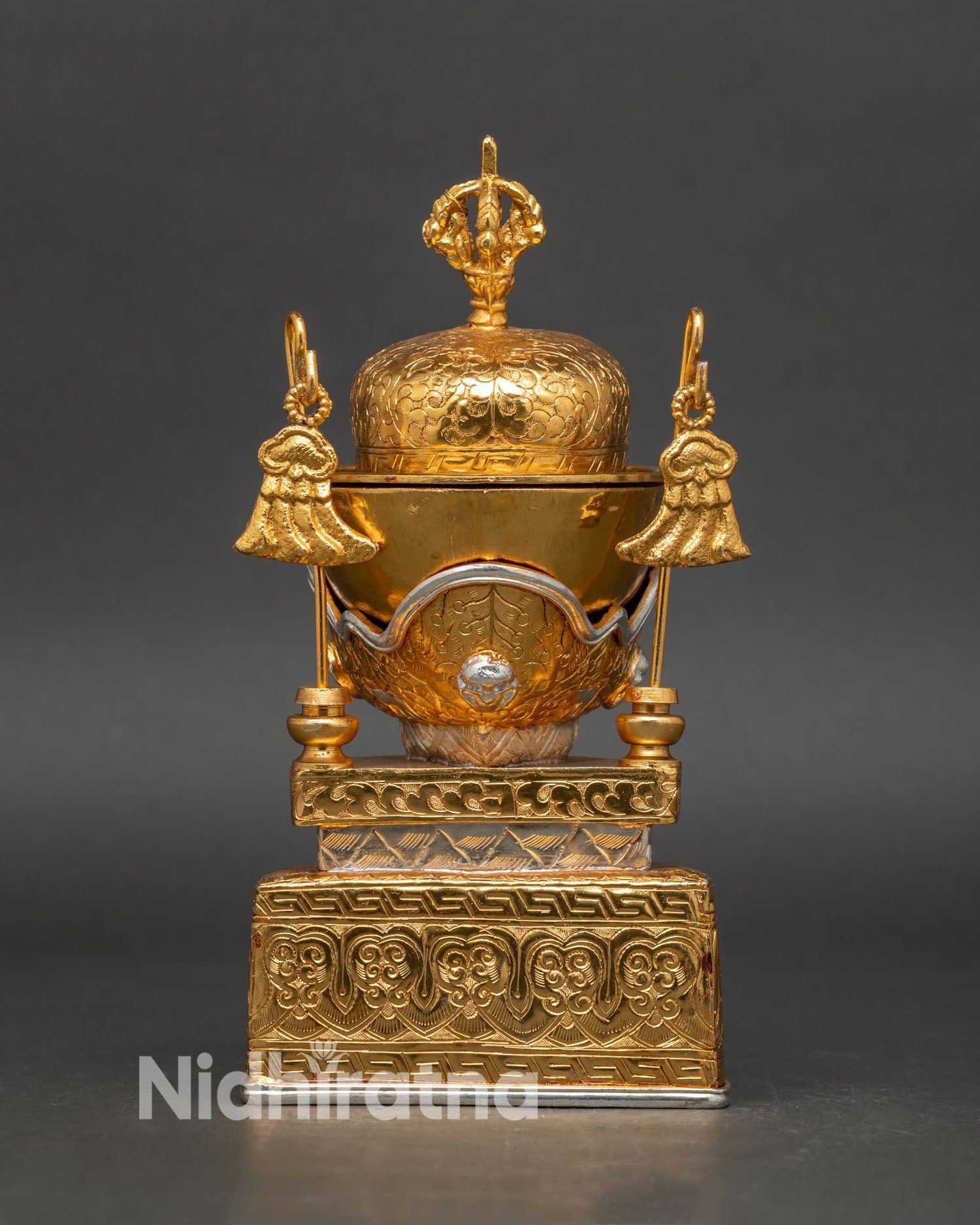 Kapala ritual vessel showing copper body ornamental detailing and symbolic Tibetan Buddhist skull cup design for tantric altar ceremonies