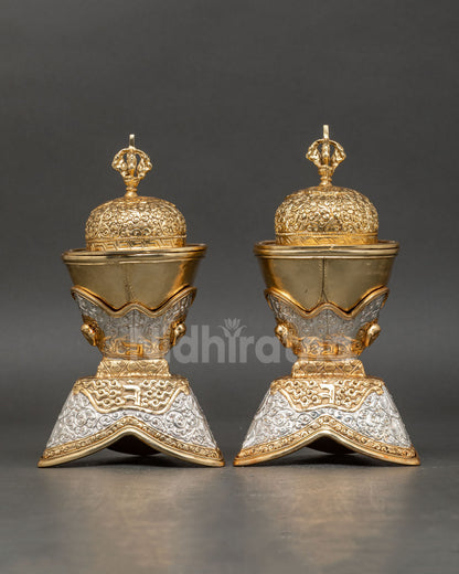 Kapala Set showing intricate filigree carvings auspicious Buddhist motifs and symbolic half vajra lid with refined Himalayan craftsmanship