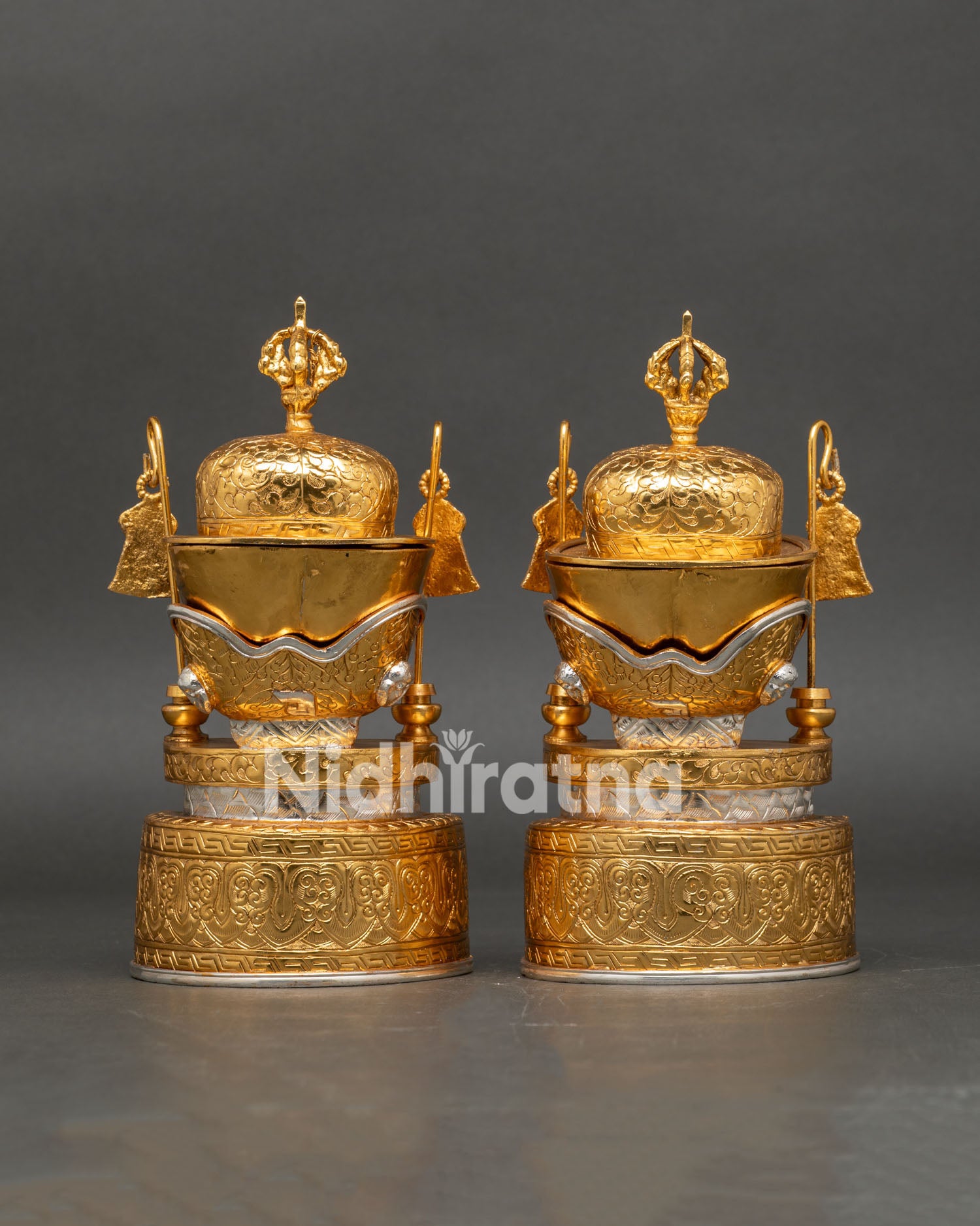 Kapala skull cup showing intricate carvings symbolic motifs and refined Himalayan Buddhist tantric craftsmanship with decorative gold plated finish