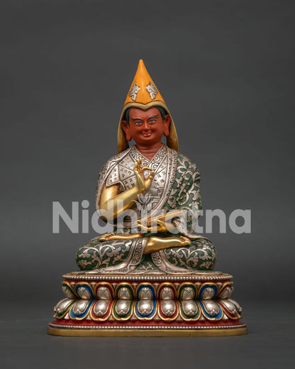 khedrup je statue handcrafted in nepal with silver plated robes and gold gilded lotus throne