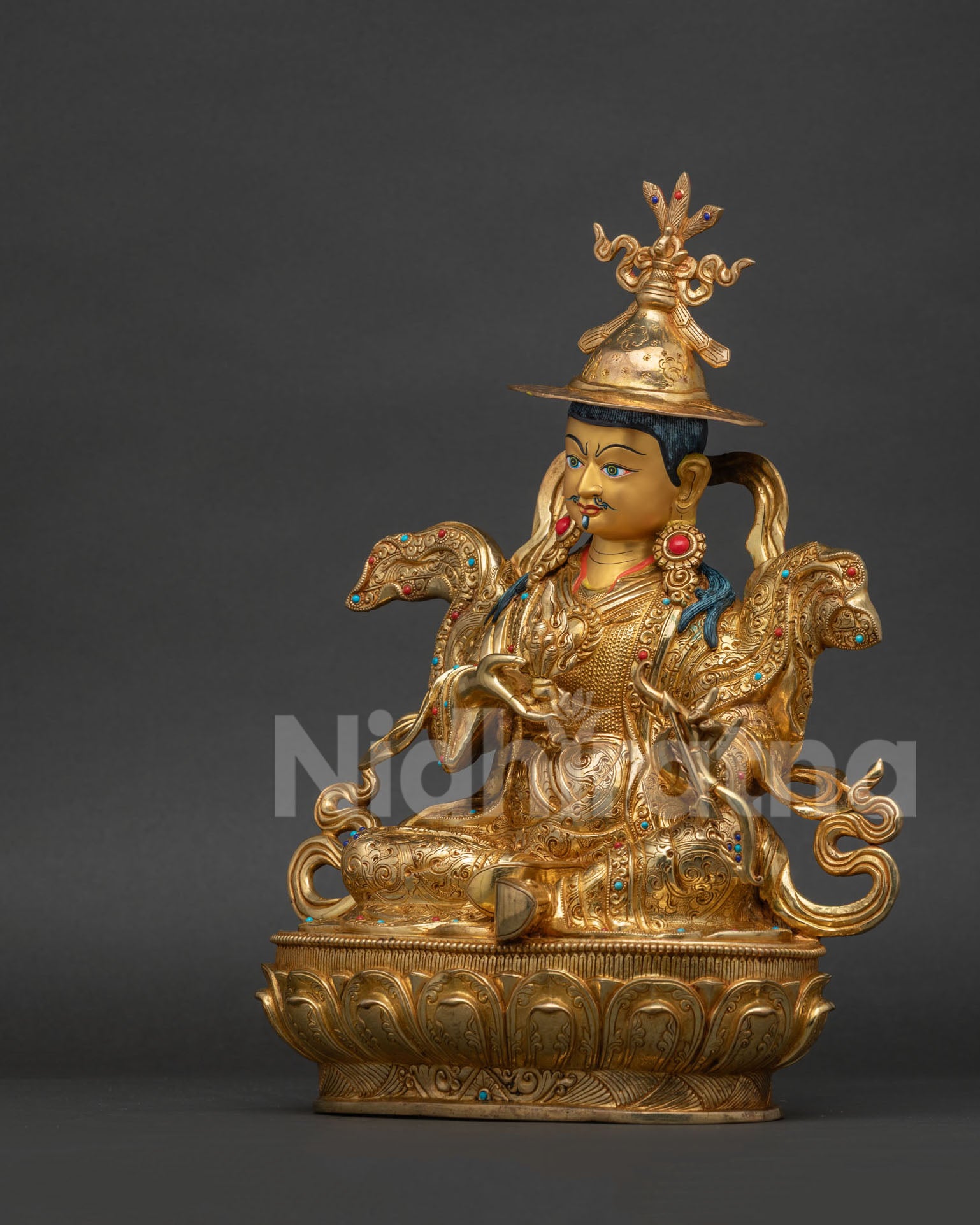 King Gesar Norbu Dradul Statue left view side with bow and arrow symbolism