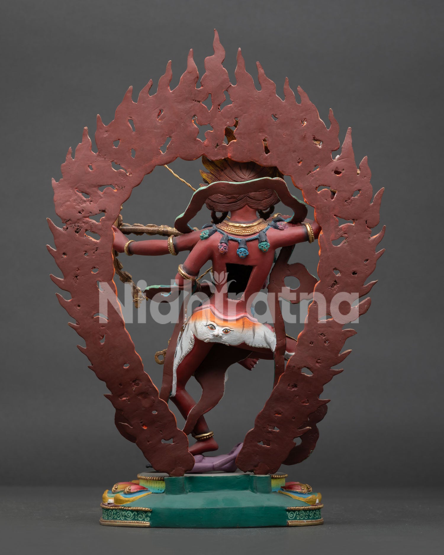 kurukulla statue back view hand carved lotus throne and flame halo detail