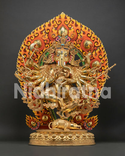 Large gold Ganesh statue with flaming halo, handcrafted Nritya Ganapati sculpture