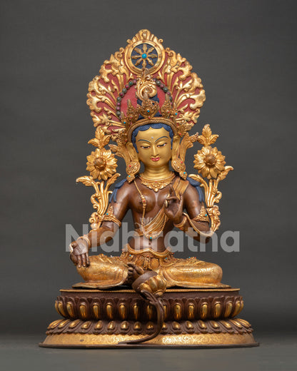 Large green tara statue from nepal with oxidized copper and gold gilded details