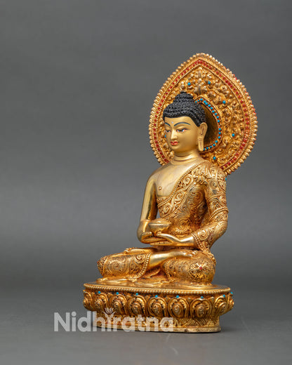 Left profile of Amitabha Buddha statue, lotus base and intricate halo with gold details