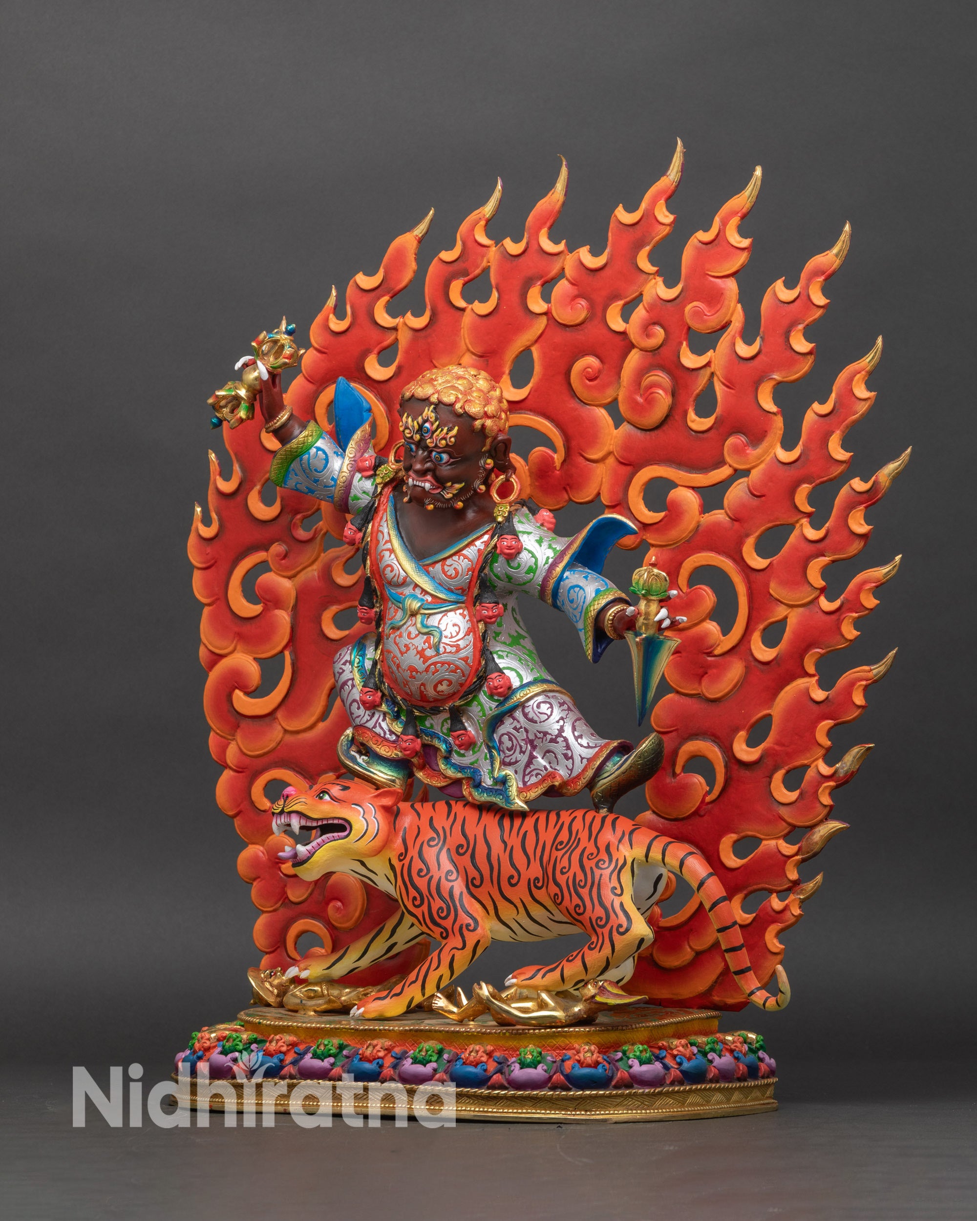 Left profile of Dorje Drolo statue with halo, copper and acrylic painted sculpture