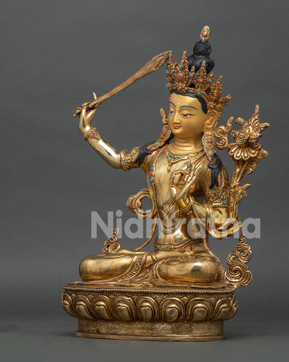 Left profile of Manjushri Bodhisattva statue with lotus seat and handcrafted details