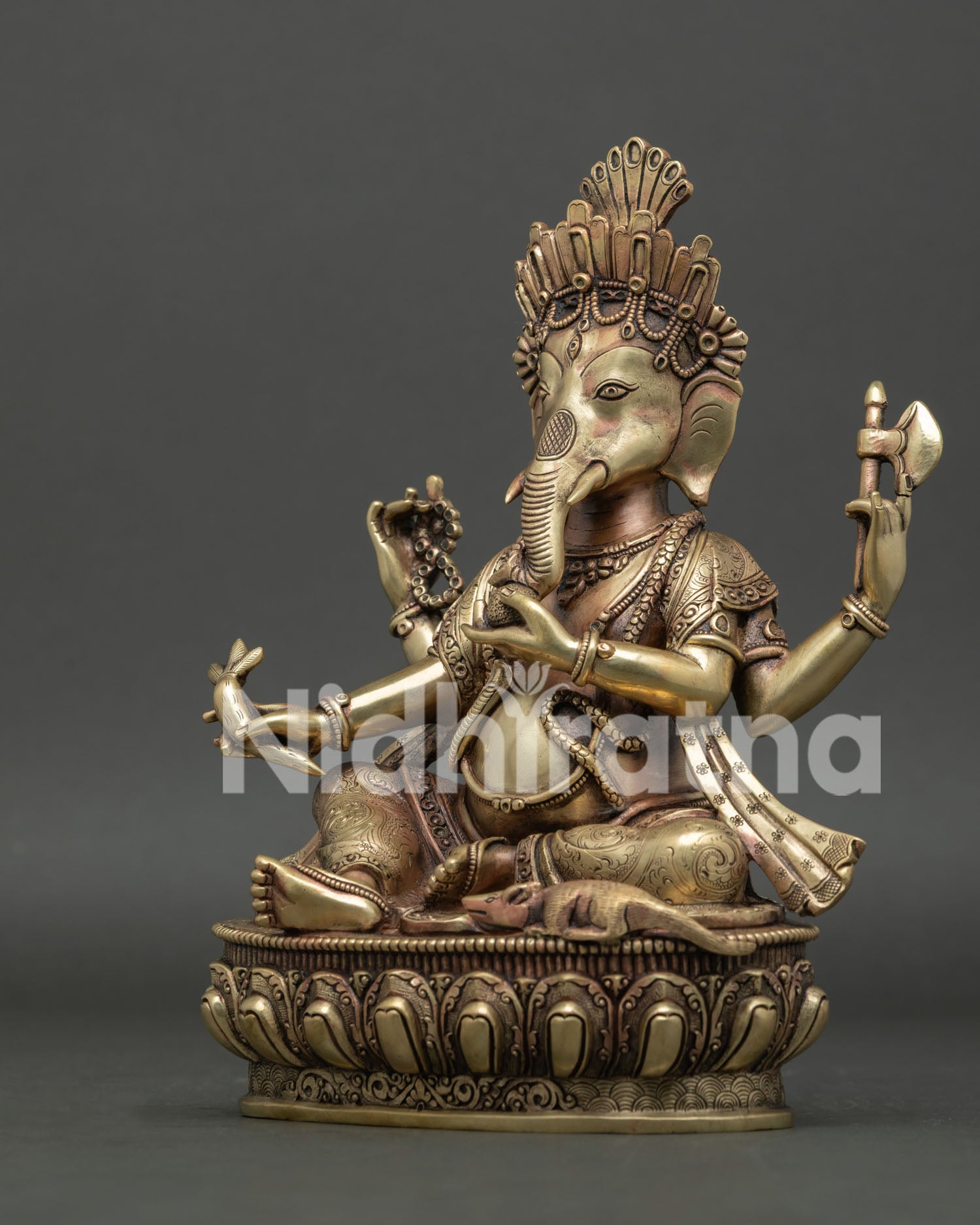 Left side angle view of authentic handcrafted Nepalese Ganesh sacred art piece.