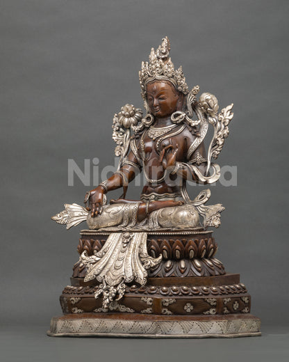 Left side handcrafted White Tara statue detailed robes and ceremonial ornaments