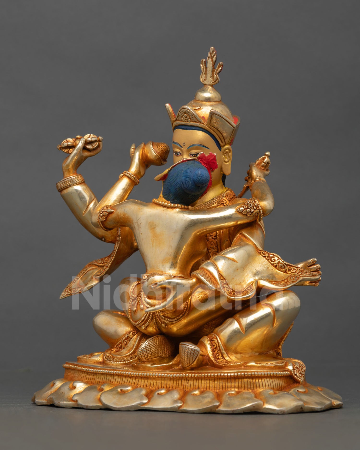 left side profile of guru padmasambhava consort statue with fire gilded details