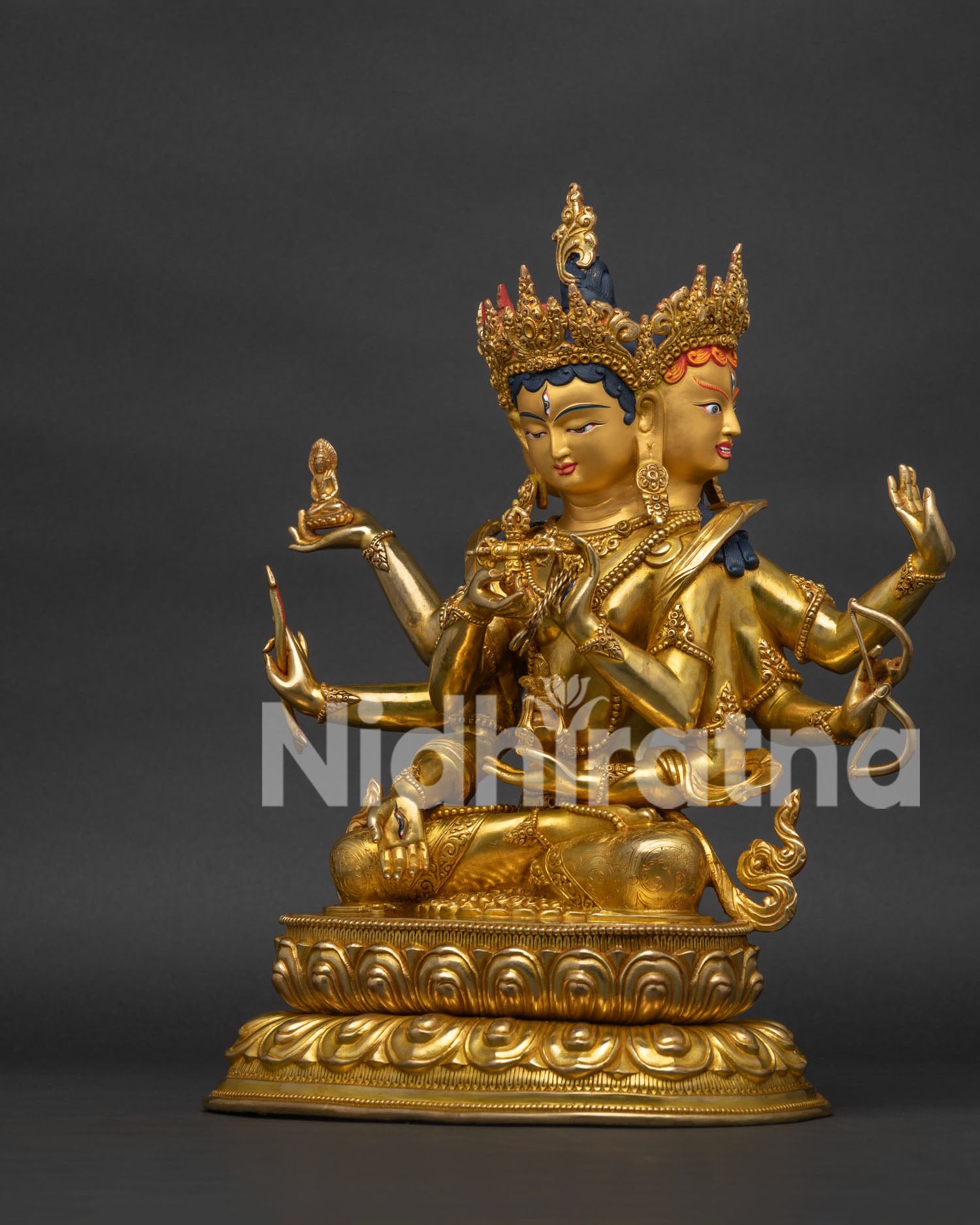 Left side profile view of 24K gold fire gilded Ushnisha Vijaya statue