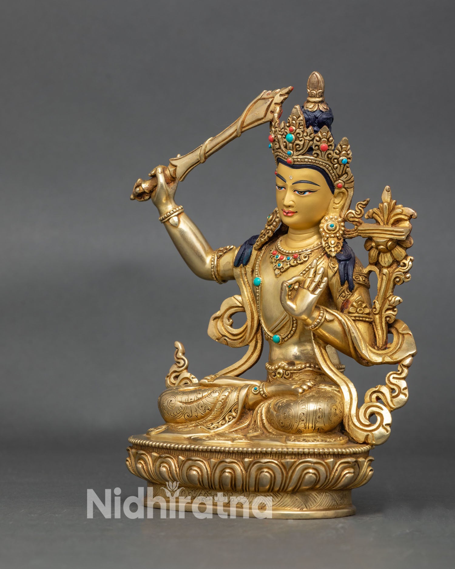 Authentic Manjushri deity sculpture in copper and 24K gold for altar display