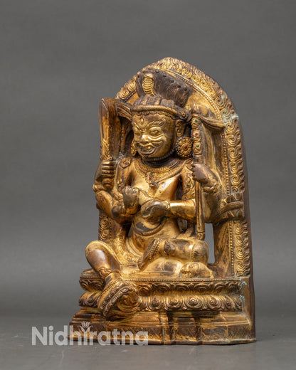 left-side-view chaturbhuja mahakala statue copper and gold with ceremonial accents
