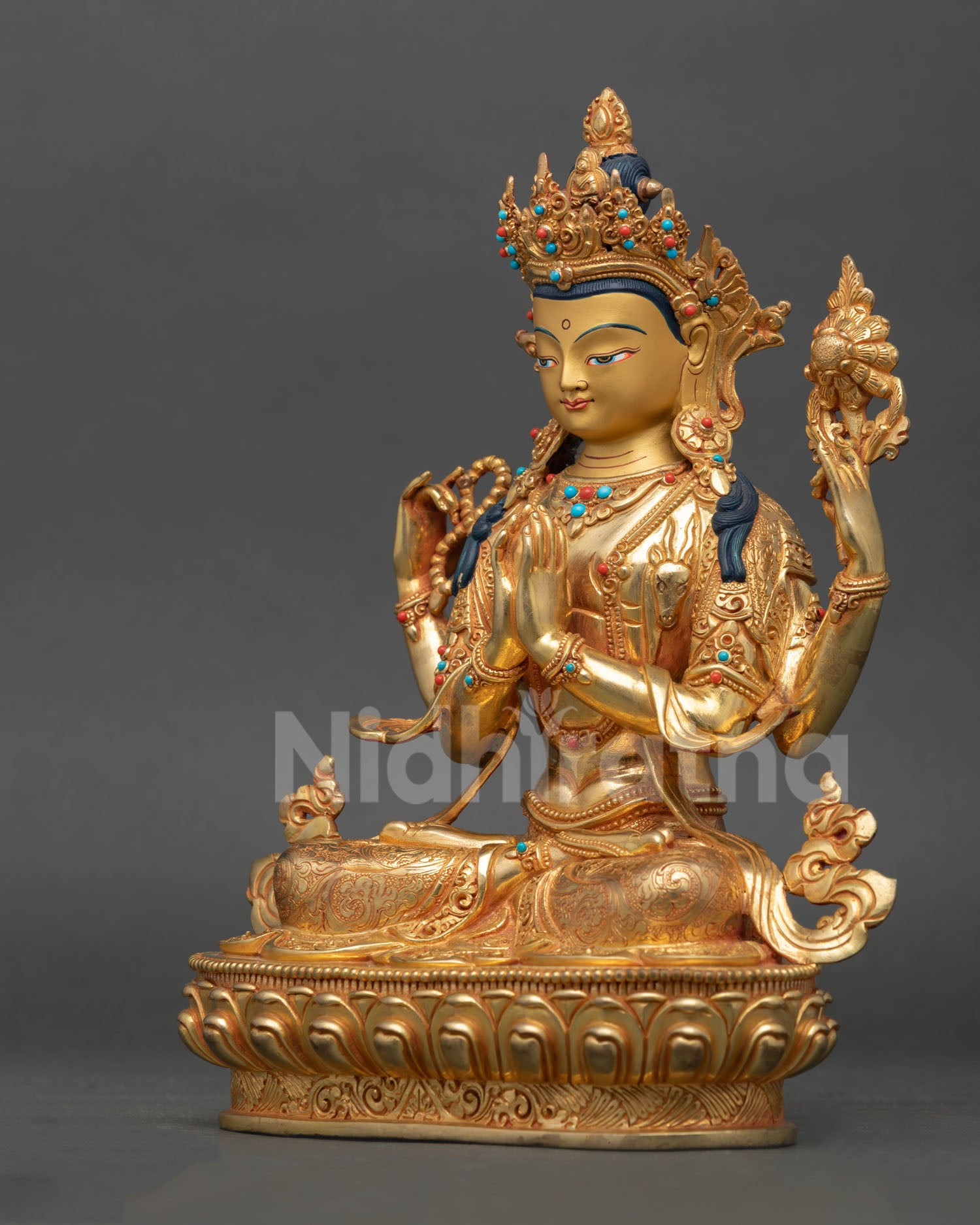 Left side view Chenrezig statue showing intricate detailing and balanced posture, traditional Buddhist art from Nepal