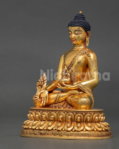 Left side view Medicine Buddha Statue, myrobalan stem detail, healing bowl, gold copper Nepal