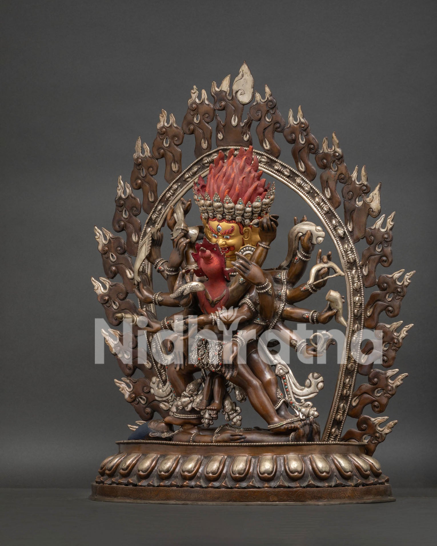 Left side view of 14-Armed Mahakala tantric Buddhist statue with oxidized copper finish crafted in Nepal
