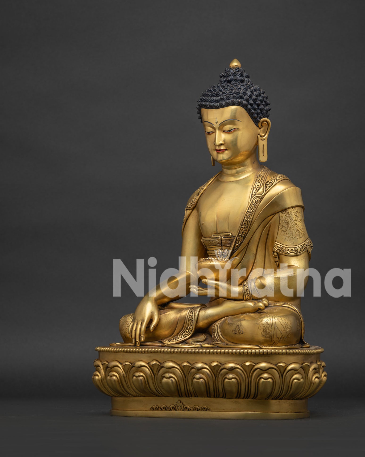 left side view of 24k gold shakyamuni buddha statue lotus pedestal nepal