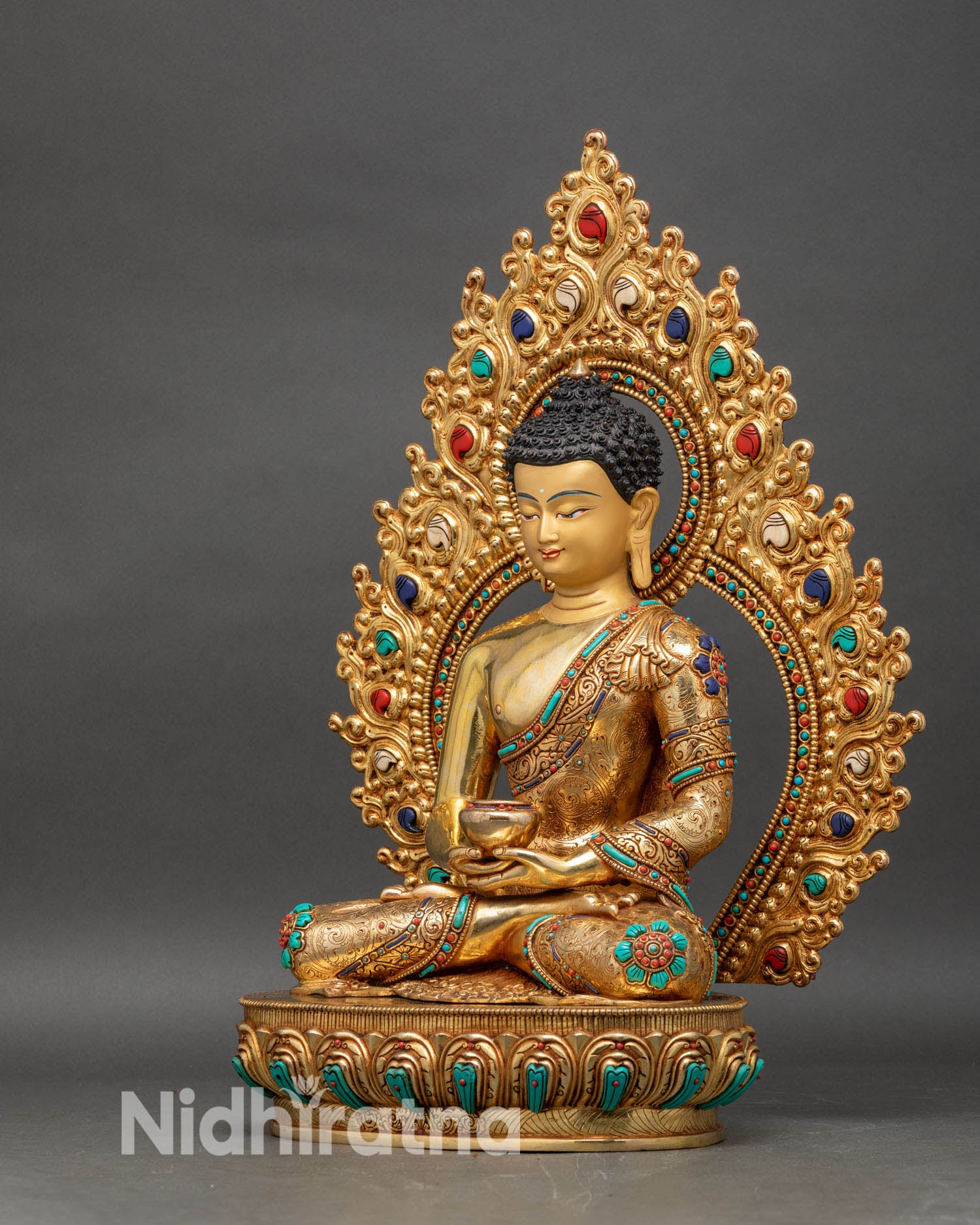 Left side view of Amitabha Buddha statue, traditional Himalayan gold-gilded artwork