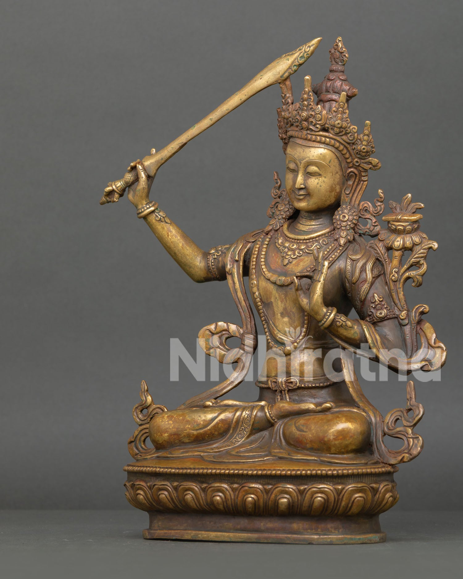 Left Side View of Antique Finish Manjushri Copper Wisdom Statue by Newari Artisans