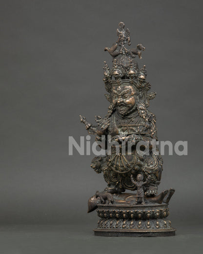 Left side view of antique Sakya Mahakala copper alloy sculpture