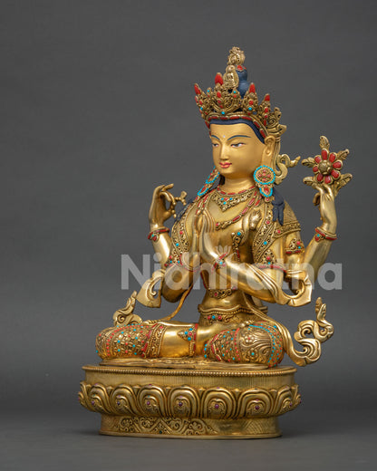 Left side view of Avalokiteshvara Chenrezig statue showing traditional Newari metal craftsmanship and gold details