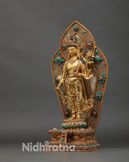 Left side view of Chenrezig Bodhisattva, gold fire-gilded halo and stone adornments