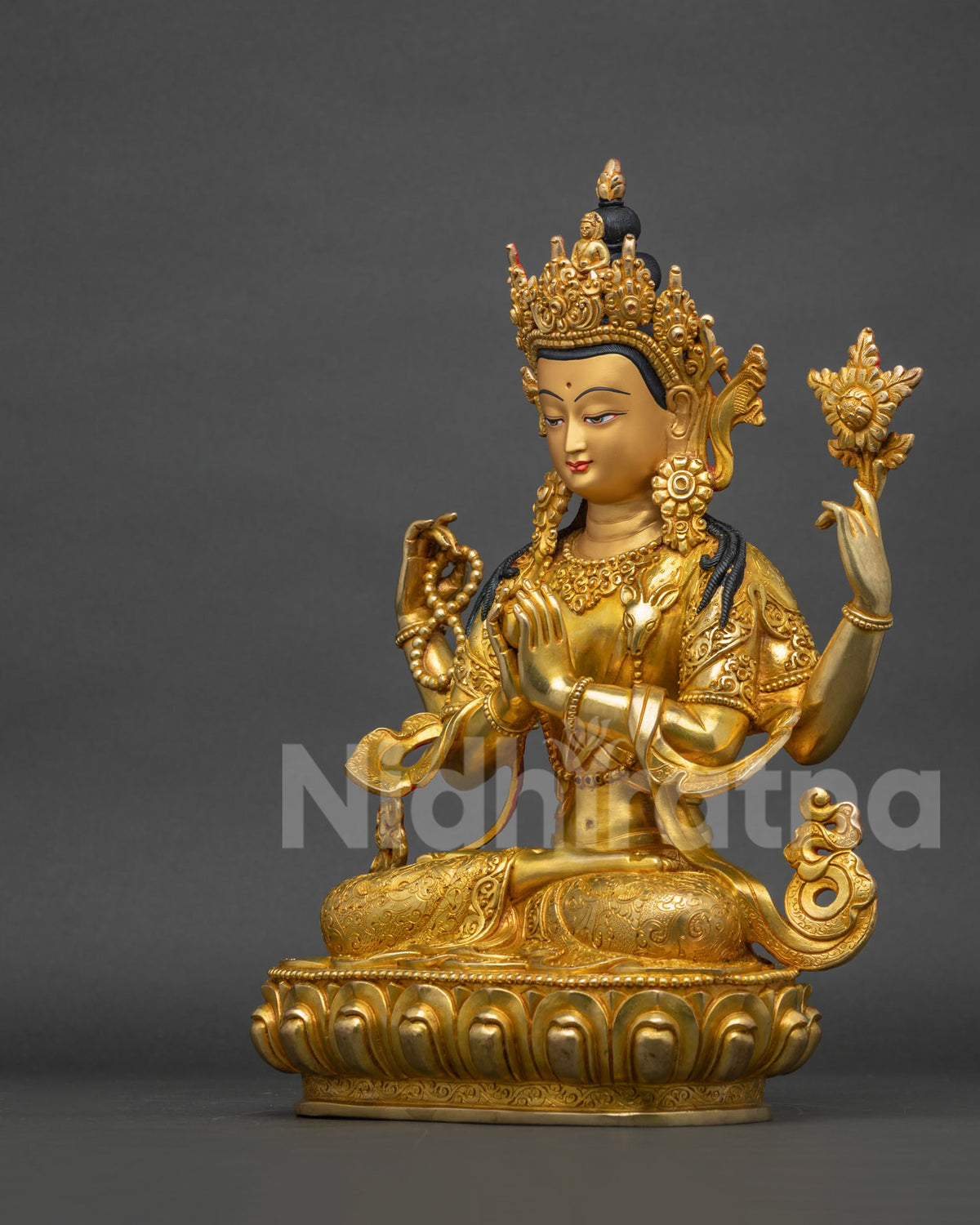 Left side view of Chenrezig statue, gold fire-gilded copper sculpture