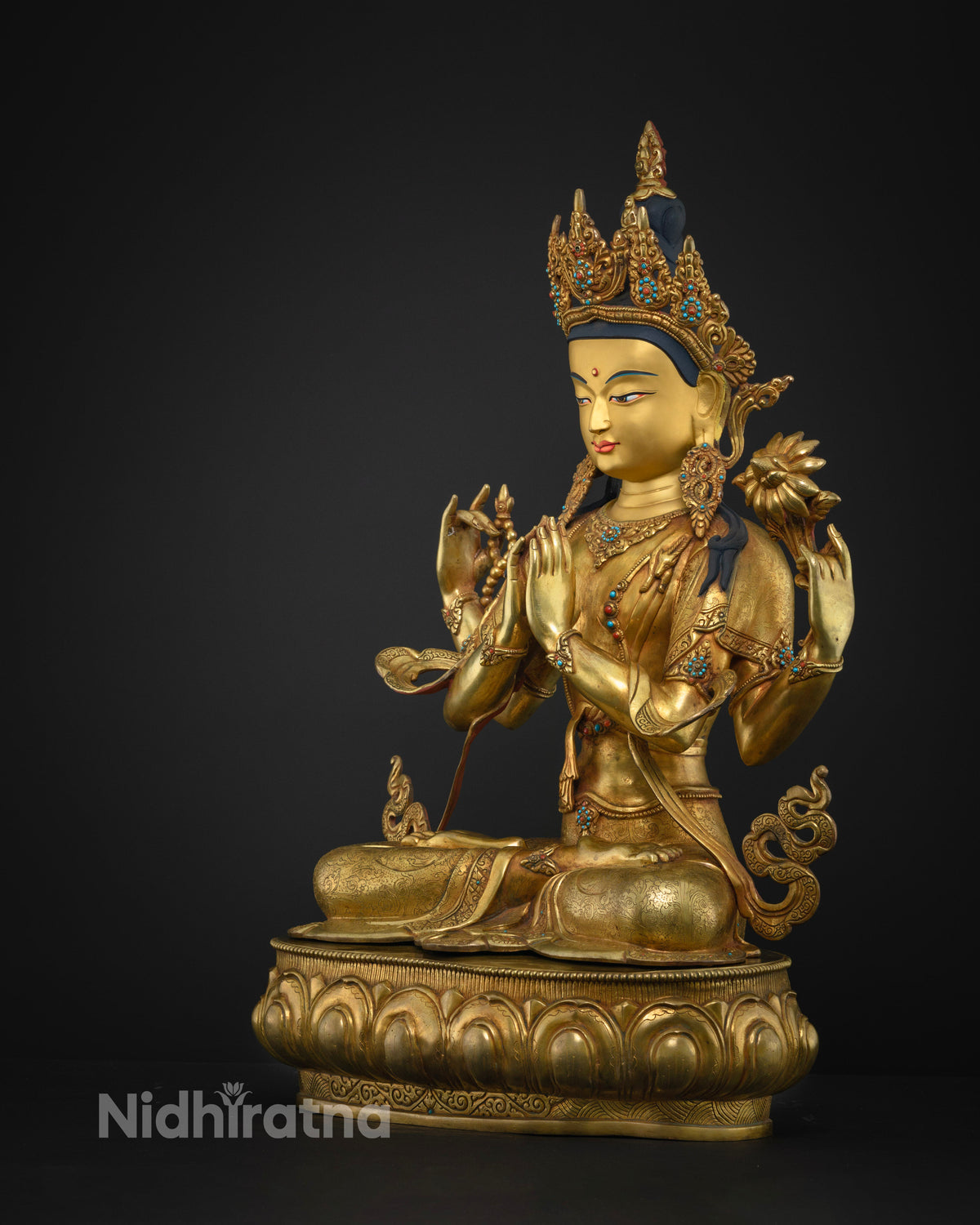 Left side view of Chenrezig statue, gold fire-gilding, Nepal lost-wax cast