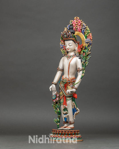 left side view of chenrezig statue showing intricate jewelry and lotus pedestal