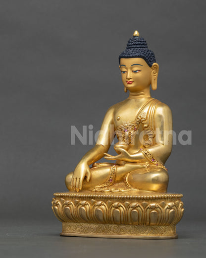 Left side view of copper Gautama Buddha statue, Newari craftsmanship