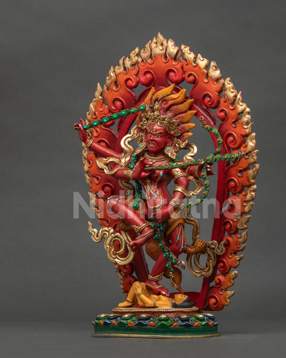 Left side view of Dancing Kurukulla copper statue with intricate Nepalese details