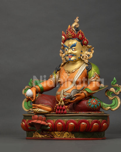 Left side view of Dzambhala statue showing detailed ornaments gemstone inlays and traditional Nepali craftsmanship