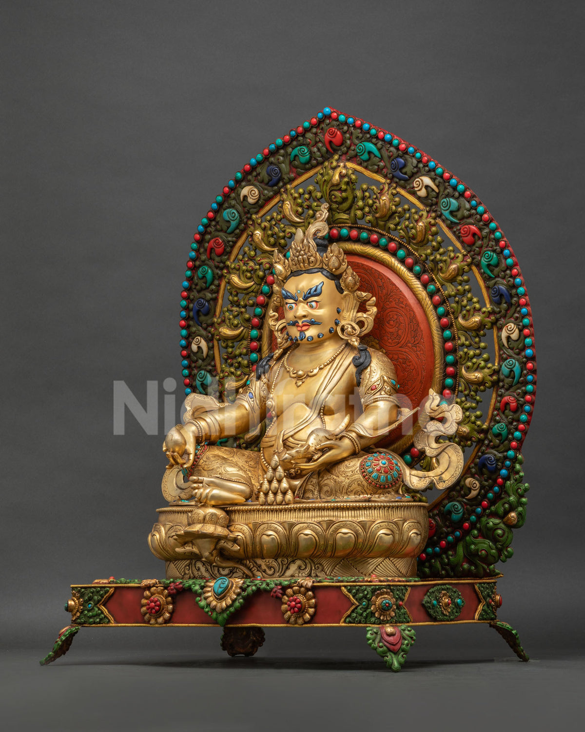 Left side view of Dzambhala throne statue, gold gilded copper Buddhist deity