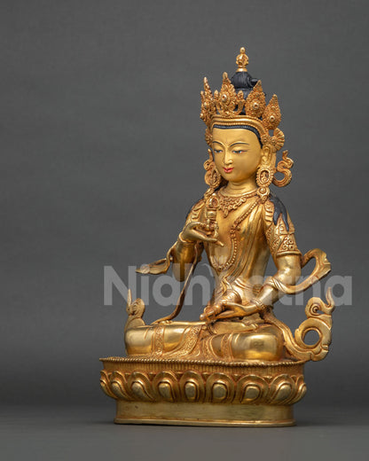 Left side view of fire-gilded Vajrasattva statue with dorje and ghanta, handcrafted Nepalese figurine
