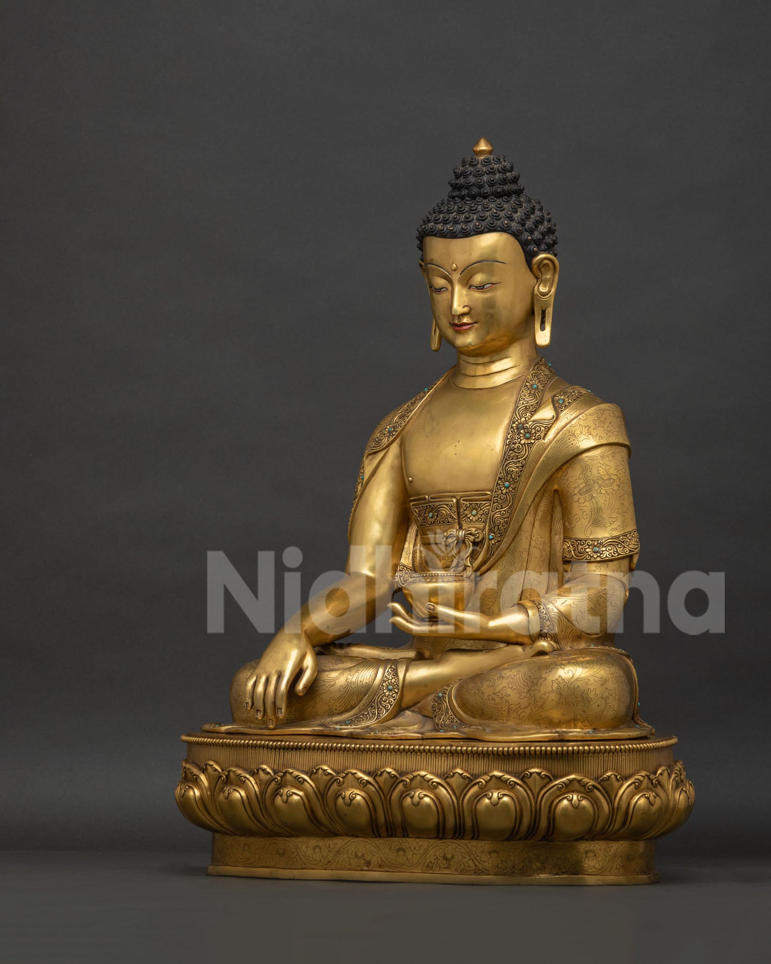 Left side view of gold fire-gilded Shakyamuni Buddha Statue from Nepal
