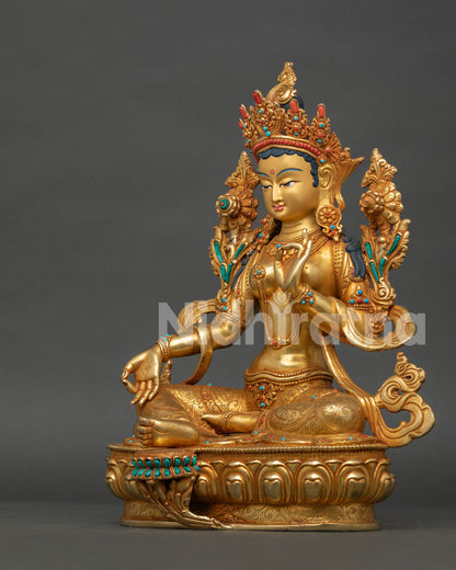 Left side view of Green Tara Bodhisattva statue with detailed Himalayan artistry