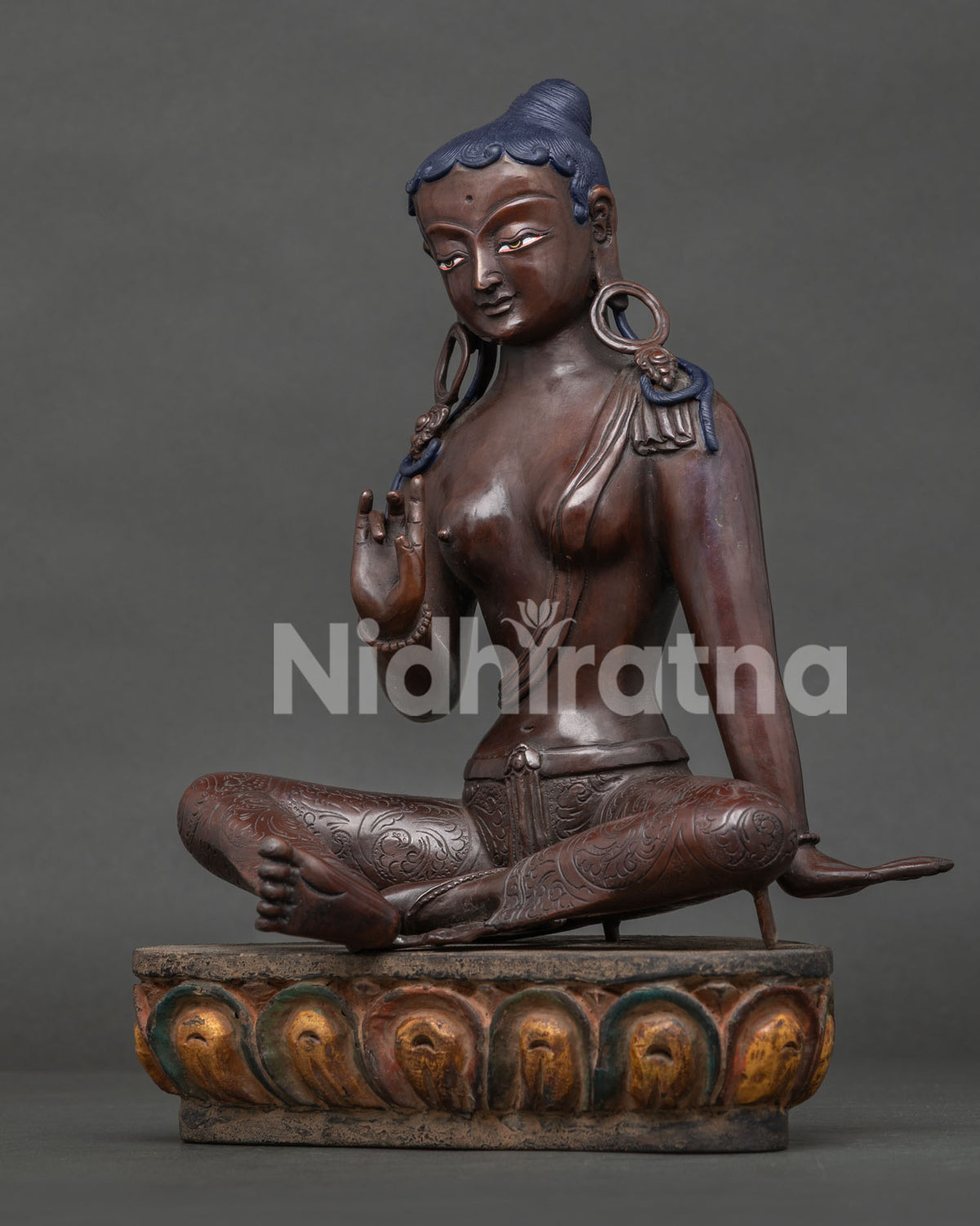 Left side view of Green Tara oxidized copper statue showing lotus base, Newari handcrafted in Nepal