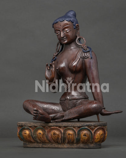 Left side view of Green Tara oxidized copper statue showing lotus base, Newari handcrafted in Nepal