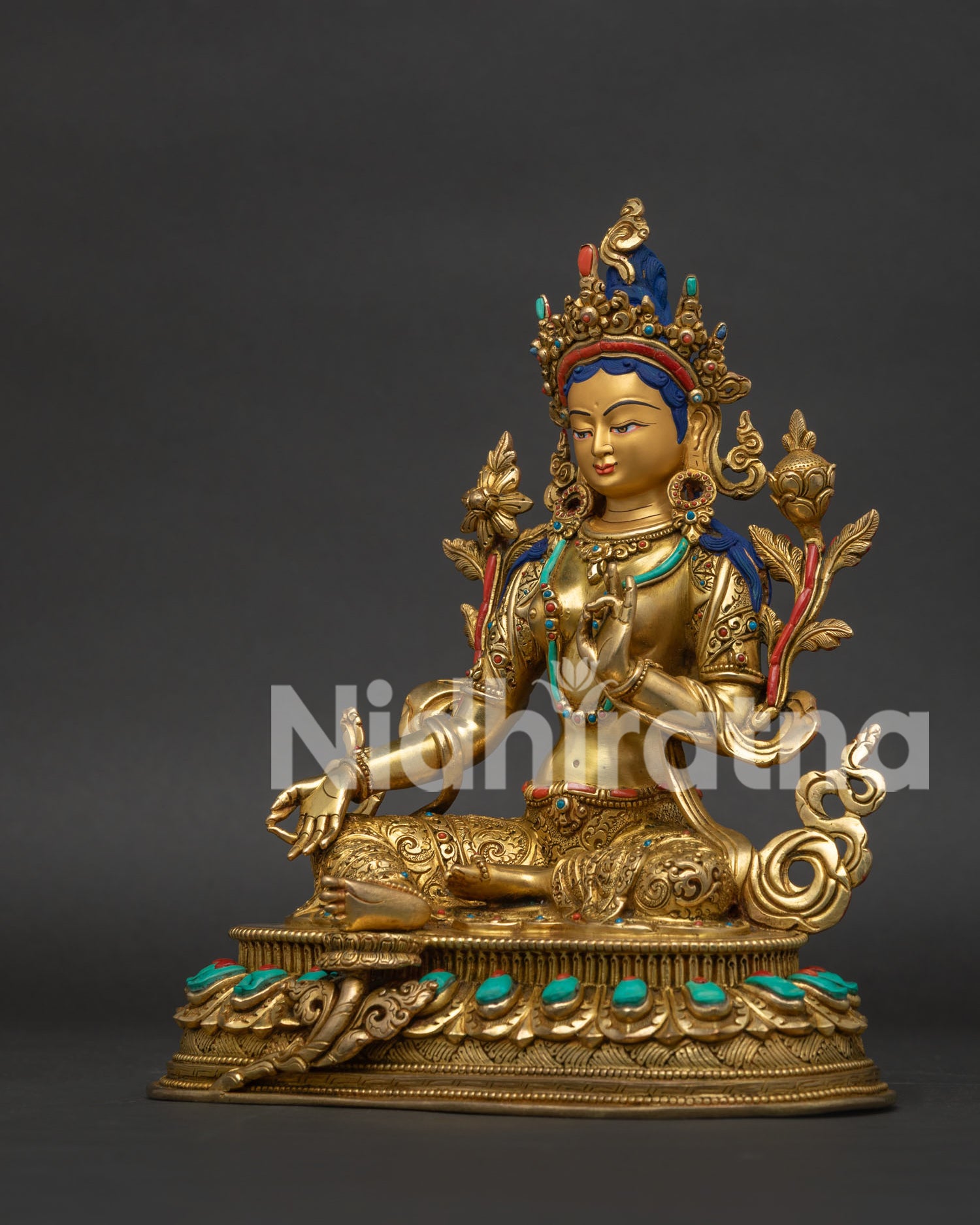 Left Side View of Green Tara Sculpture from Nepal with Intricate Robe Patterns and Gold-Gilded Artwork