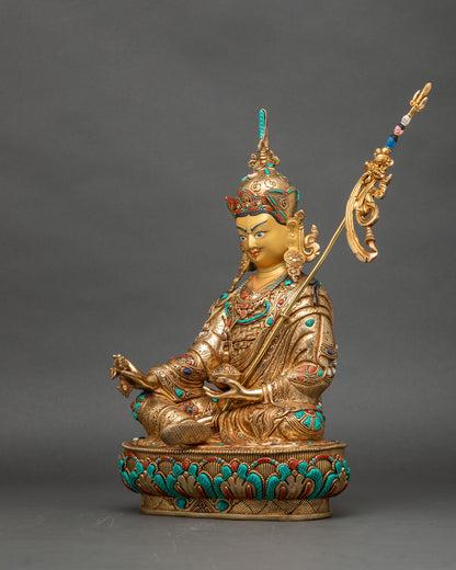 Left side view of Guru Rinpoche, gold fire-gilded copper, Padmasambhava altar sculpture