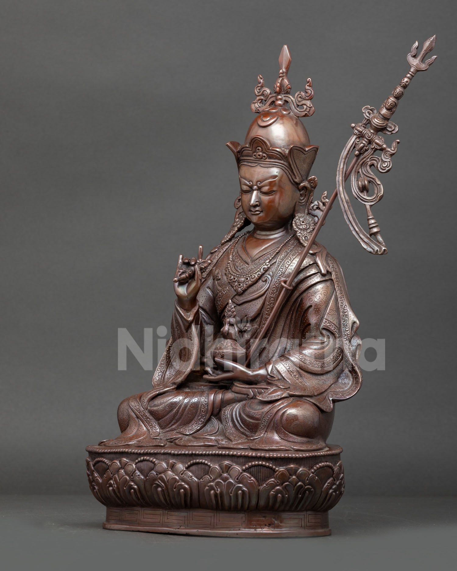 Left side view of Guru Rinpoche Tsokye Dorje statue made with lost-wax casting