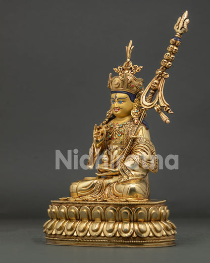 Left side view of Guru Tsokye Dorje Statue featuring khatvanga and handcrafted Newari artistry