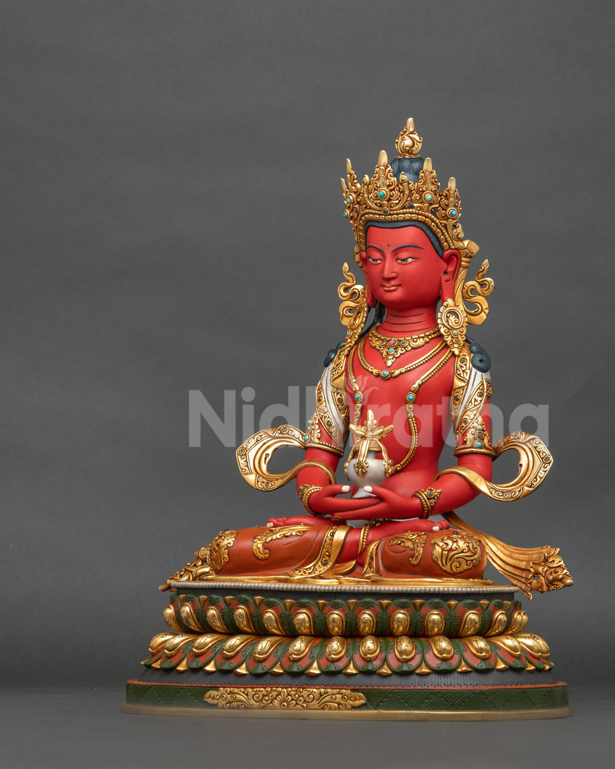 Left side view of handcrafted Amitayus Buddha sculpture with flowing scarves and lotus base